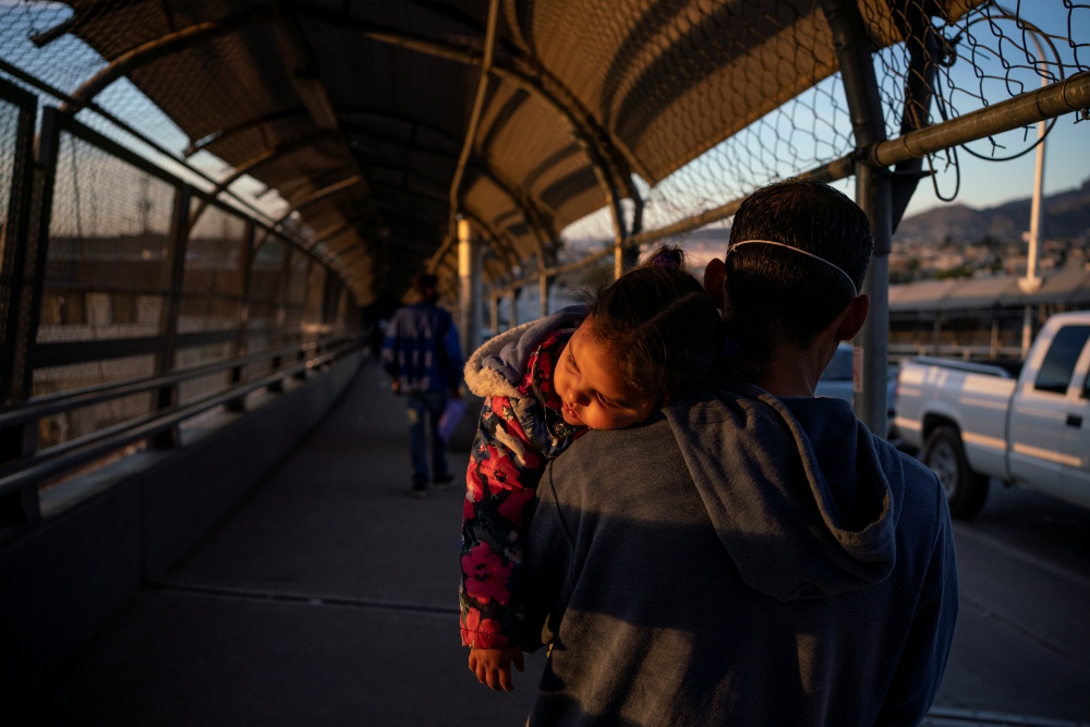 A Honduran immigrant near El Paso, Texas, walks back to Ciudad Juárez, Mexico, April 20, after U.S. Customs and Border Protection changed his family's dates for immigration court during the coronavirus pandemic. (CNS/Reuters/Paul Ratje) A Honduran immigrant near El Paso, Texas, walks back to Ciudad Juárez, Mexico, April 20, after U.S. Customs and Border Protection changed his family's dates for immigration court during the coronavirus pandemic. (CNS/Reuters/Paul Ratje)